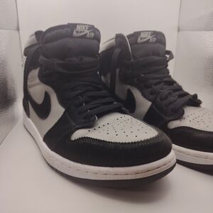 Nike Black and White Mid-Top Sneakers
